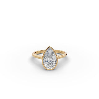 Pear Lab Grown Diamond Bezel Solitaire Ring in yellow gold, front view