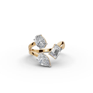 Pear Lab Grown Diamond Statement Ring with Emerald and Oval Accents in yellow gold, front view