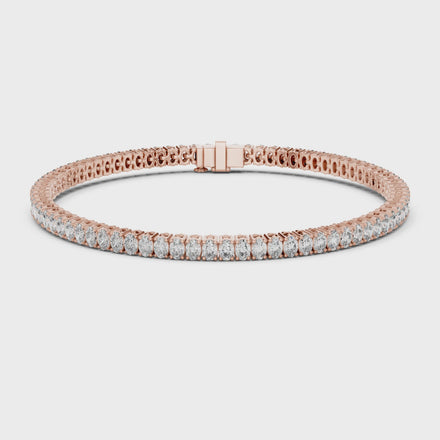 Oval cut lab grown diamond tennis bracelet in yellow gold white gold and rose gold with elegant luxury diamond setting