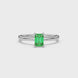 Emerald cut green gemstone solitaire ring in double band gold setting