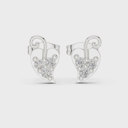 Diamond heart swirl stud earrings in gold by Signora Jewels