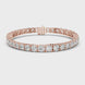 Graduated lab grown diamond tennis bracelet with varying size round diamonds in yellow white and rose gold