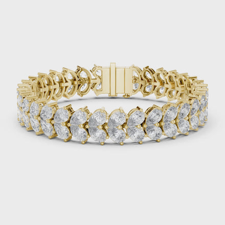 Luxury pear shape diamond tennis bracelet in gold with brilliant lab grown diamonds by Signora Jewels