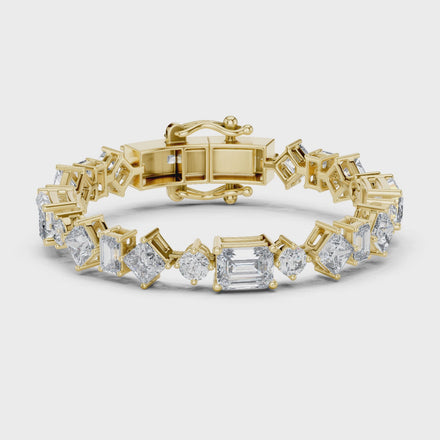 Luxury mixed shape diamond tennis bracelet in gold with emerald, princess, and round lab grown diamonds by Signora Jewels