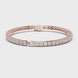 Pear accent lab grown diamond tennis bracelet with round diamonds and central pear cut diamond in gold variations