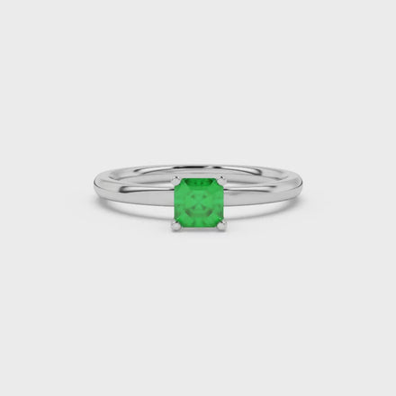 Green Asscher cut solitaire ring in gold featuring a 5.00 MM gemstone in a classic four-prong cathedral setting