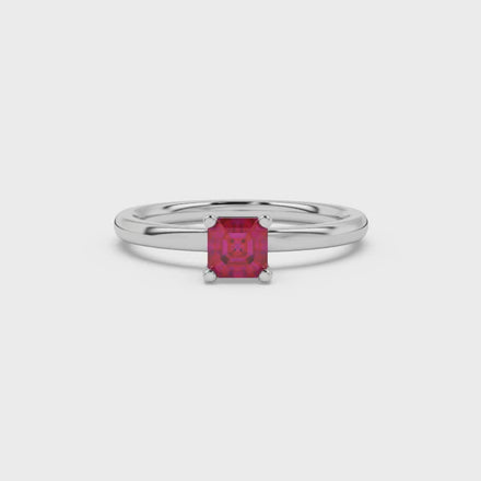 Asscher cut gemstone solitaire ring in gold with four-prong setting