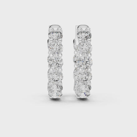 Diamond inside-out hoop earrings with round brilliant diamonds