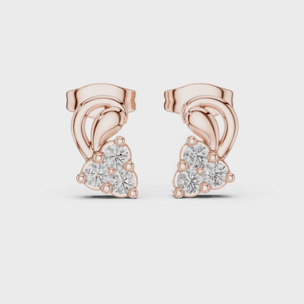 Diamond swirl floral stud earrings in gold by Signora Jewels