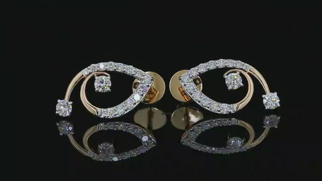 360-degree view of yellow gold paisley swirl earrings with round lab grown diamonds