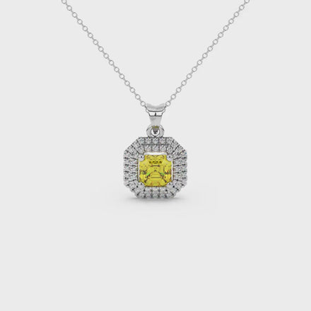 Octagon halo gemstone pendant in gold featuring an Asscher cut center gemstone surrounded by sparkling round accent diamonds
