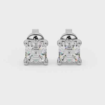 Asscher cut gemstone stud earrings in gold with four-prong basket setting and screw-back closure