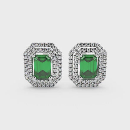 Emerald cut green gemstone double halo stud earrings with octagonal diamond halo in gold