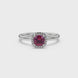 Red cushion cut gemstone halo ring with diamond accents in gold