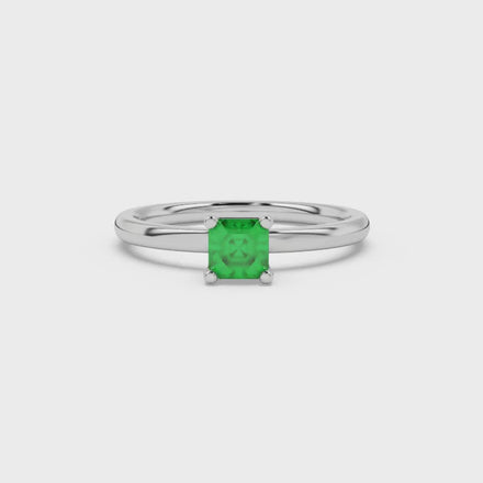 Asscher cut gemstone solitaire ring in gold with four-prong setting