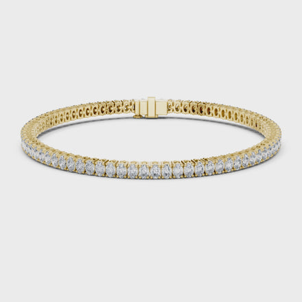Oval cut lab grown diamond tennis bracelet in yellow gold white gold and rose gold with elegant luxury diamond setting