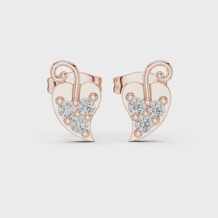 Diamond heart swirl stud earrings in gold by Signora Jewels