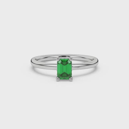 Emerald cut green gemstone halo ring with round lab grown diamond halo in rose gold
