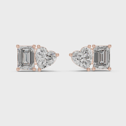 Heart and emerald cut diamond stud earrings in rose gold finish