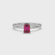 Emerald cut red gemstone solitaire ring in gold four prong setting