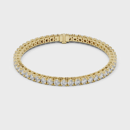 Classic round diamond tennis bracelet available in yellow gold white gold and rose gold with 49 brilliant diamonds in elegant collet setting design