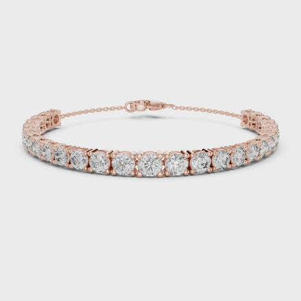 Graduated lab grown diamond tennis bracelet in yellow gold white gold and rose gold with round brilliant diamond design