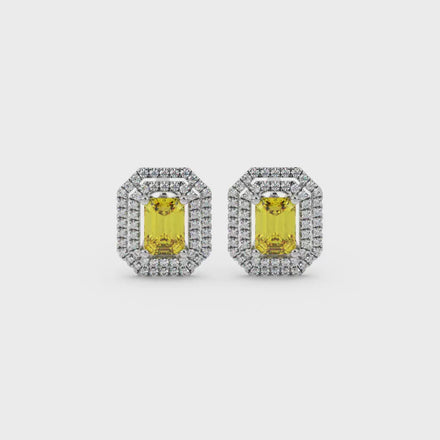 Emerald cut yellow gemstone double halo stud earrings with octagonal diamond halo in gold