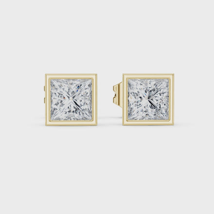 Princess cut solitaire diamond stud earrings in gold with bezel setting and lab grown diamonds by Signora Jewels