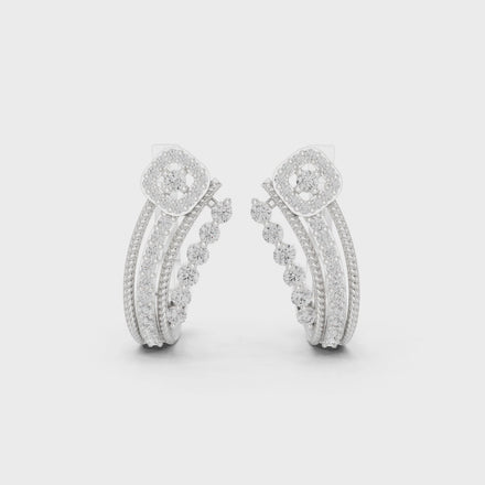 Diamond crossover hoop earrings in gold by Signora Jewels