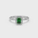 Green emerald cut gemstone halo ring with split shank band and diamond accents