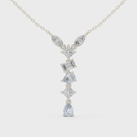 Mixed shape diamond drop pendant in gold with marquise, pear, emerald and princess cut lab grown diamonds by Signora Jewels