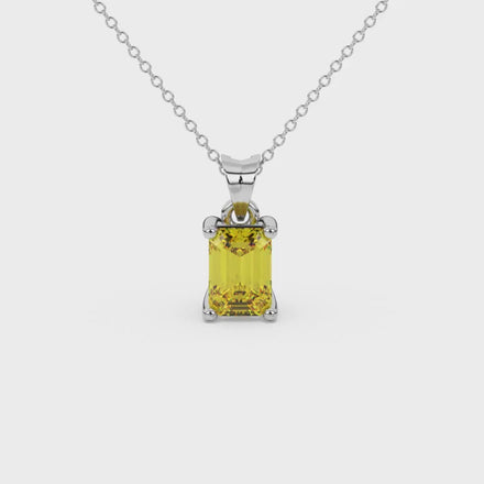 Emerald cut yellow gemstone solitaire pendant in rose gold four prong setting