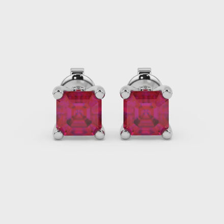 Hidden halo Asscher cut solitaire stud earrings featuring 5.00 MM gemstones in a four-prong gold setting