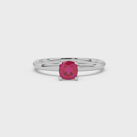 Red cushion cut solitaire gemstone ring with accent diamonds in rose gold four prong setting