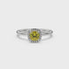 Yellow cushion cut gemstone halo ring with diamond accents in gold