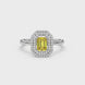 Emerald cut yellow gemstone double halo ring with octagonal diamond frame in gold