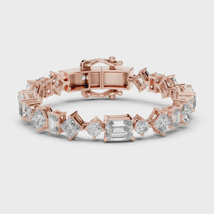Luxury mixed shape diamond tennis bracelet in gold with emerald, princess, and round lab grown diamonds by Signora Jewels