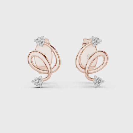 Minimal diamond swirl stud earrings in gold with round brilliant