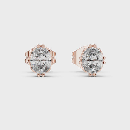 Oval cut solitaire diamond stud earrings in gold with lab grown diamonds by Signora Jewels