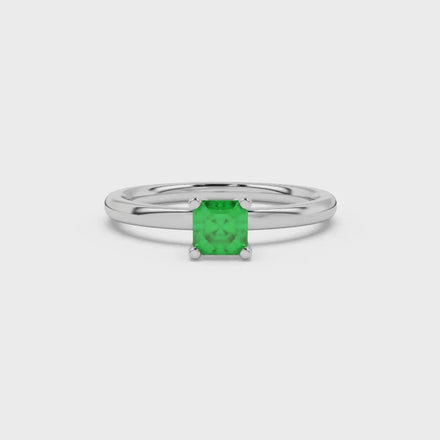 Asscher cut gemstone solitaire ring in gold with four-prong setting