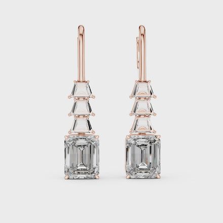 Gold emerald cut diamond drop earrings for women