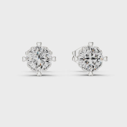 Cushion cut solitaire stud earrings in gold