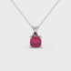 Red cushion cut gemstone pendant with accent diamonds in white gold basket setting