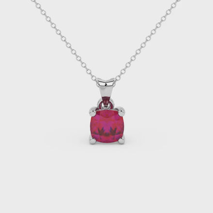 Red cushion cut gemstone pendant with accent diamonds in white gold basket setting