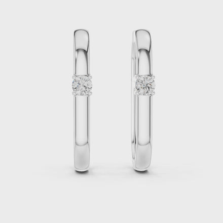 solitaire diamond hoop earrings, oval hoop earrings with single diamond, minimal gold hoop earrings, modern diamond hoops, everyday luxury earrings