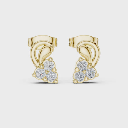 Diamond swirl floral stud earrings in gold by Signora Jewels