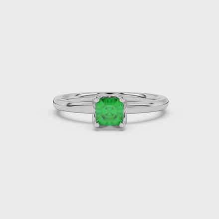 Green Asscher cut solitaire ring in gold featuring a floral-inspired four-prong basket setting with a 5.00 MM center gemstone