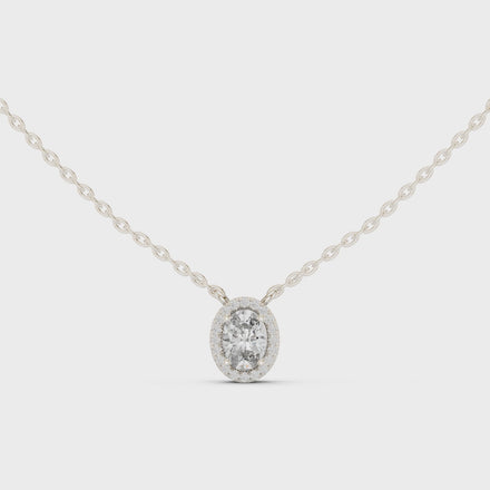 Minimal oval halo diamond pendant in gold with lab grown diamonds by Signora Jewels