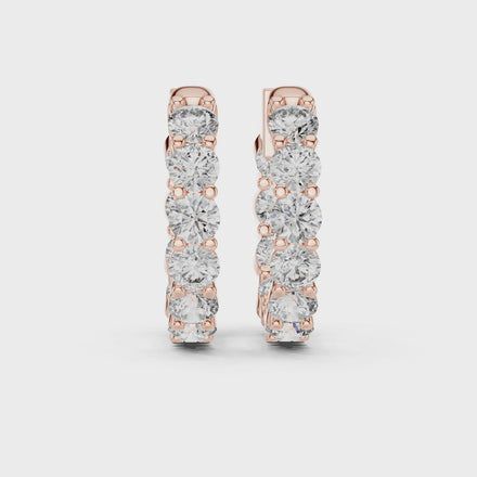 Diamond inside-out hoop earrings with round brilliant diamonds