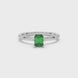 Emerald cut green gemstone solitaire ring in six prong gold setting